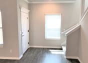 Thumbnail 26 of 60 - B3 (1-car) Entry with laminate wood flooring facing staircase