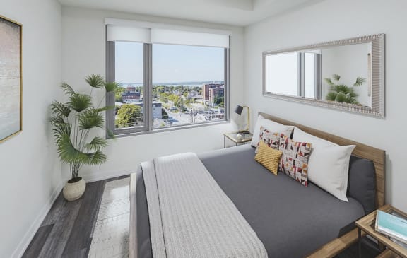Large Bedroom with picture window and ample closet space