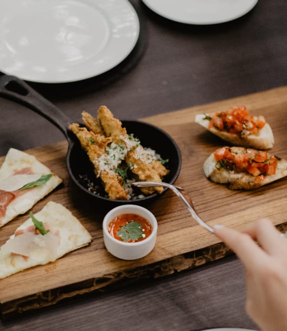 a plate of food on a wooden table