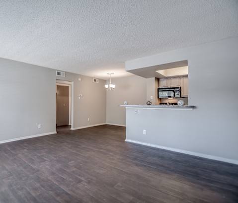 Living Room at Trinity Village Apartments, Dallas, TX