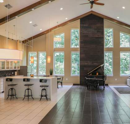 a large living room with a piano and a pool table at Cascades Overlook Apts., Owings Mills, 21117