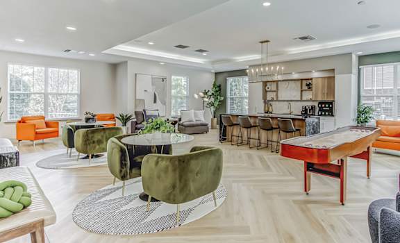 our apartments offer a clubhouse with a foosball table