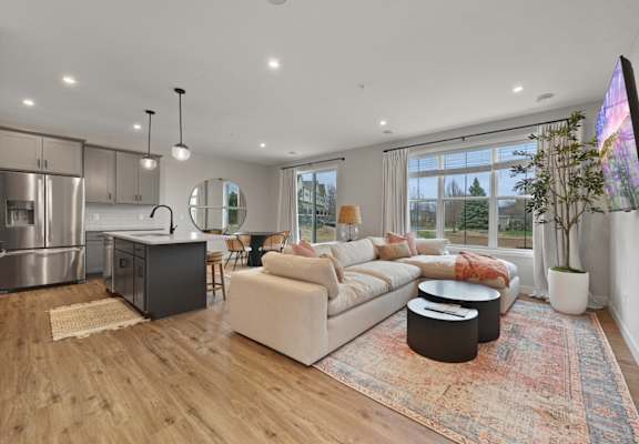 a living room with a couch and a table