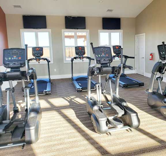 fitness center at Copper Creek Apartment Homes in Maize, KS