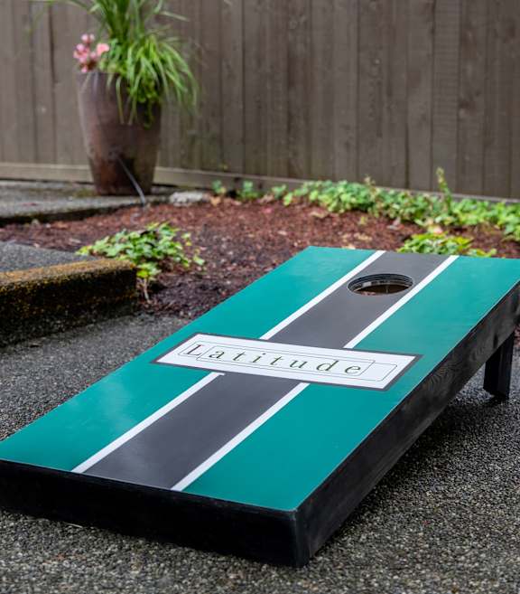 A black and teal box with the word Laurel on it.