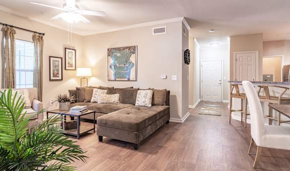 a living room with a couch and a table