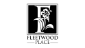 a black and white logo with a flower in the letter i