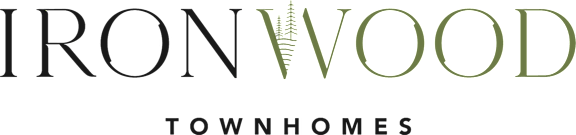 A logo with the words "iron wood townhomes".