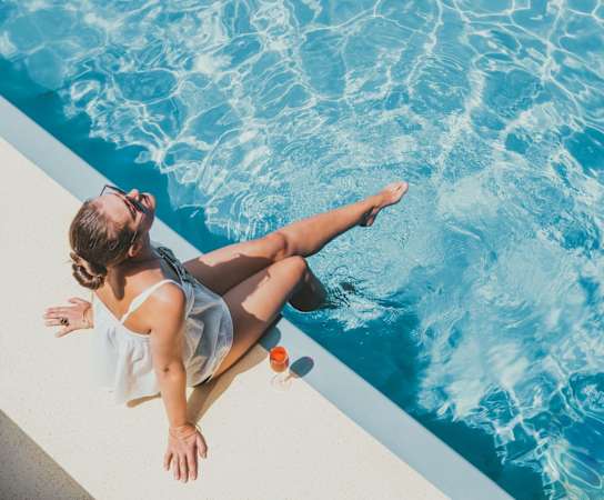 Woman at Swimming Pool at Saddleworth Green, Florida