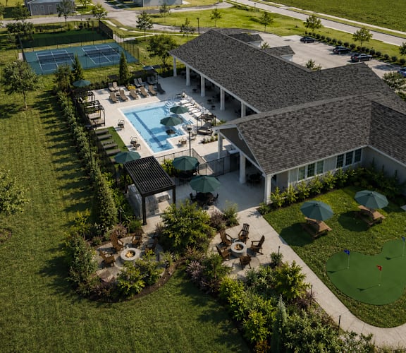 A large house with a pool in the backyard.