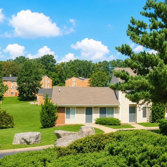 A residential area with houses and greenery.