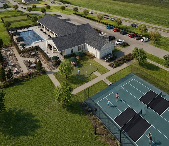 A tennis court with two players on it.