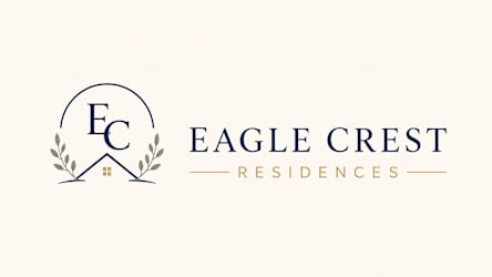 The image is a logo for Eagle Crest Residences.