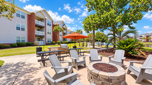 A sunny day at the outdoor seating area of a residential building.