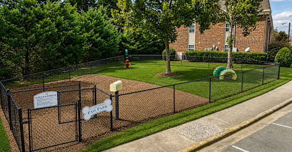 A playground with a sign that says "PLAY PARK".