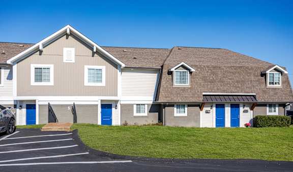 Apartments in Antioch, TN 37013 for Rent – Hickory Lake - A building with a grey roof and blue doors.