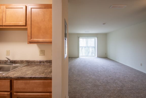 This is a photo of the kitchen of a 1245 square foot 2 bedroom apartment at Cambridge Court Apartments in Dallas, TX.