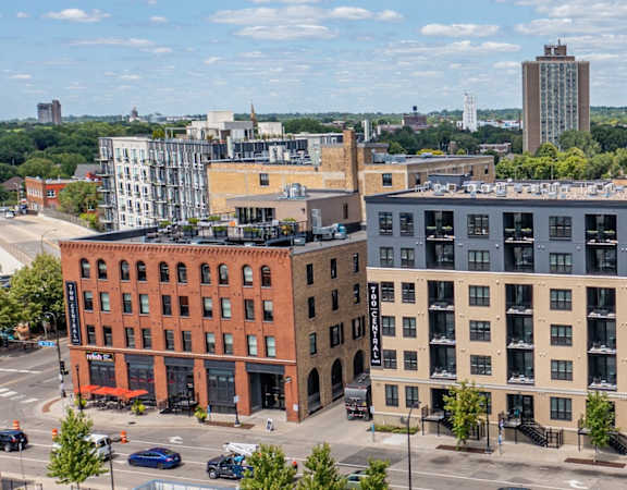 an aerial view of several buildings in a city