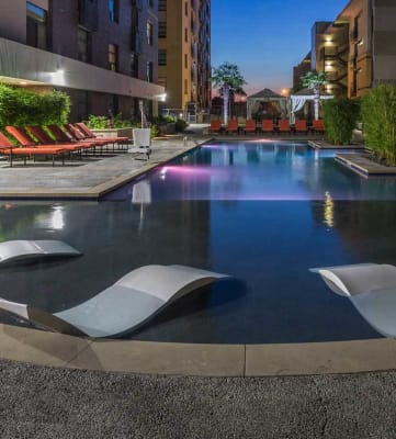 Swimming Pool with Lounge Seating at Berkshire Riverview in Austin, TX 78741