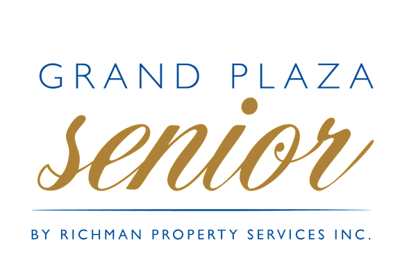 a script font with the words grand plaza against a green background