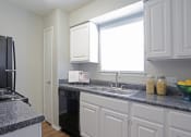Thumbnail 8 of 22 - brandon-oaks-kitchen