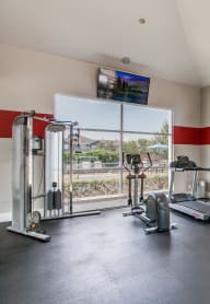 the gym at the flats at big tex apartments