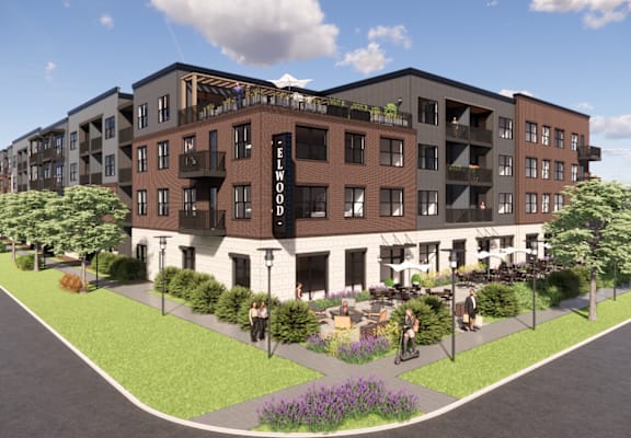 The Elwood exterior rendering with landscaped courtyard - Kokomo, IN