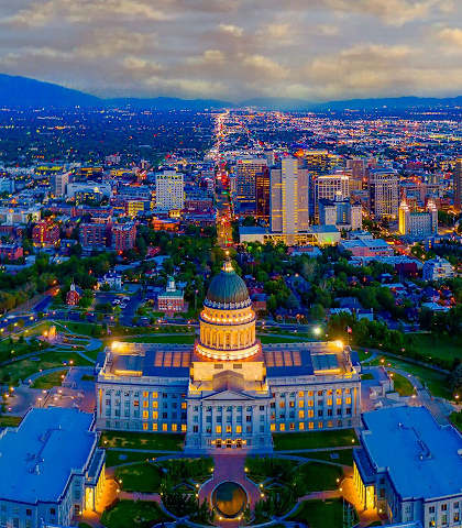 an aerial view of the capitol building at night