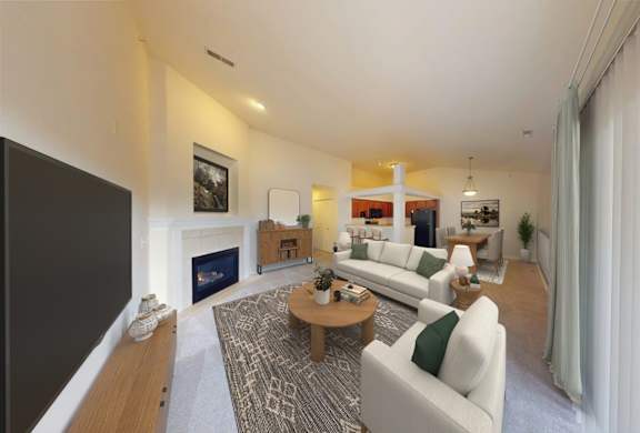 A living room with a fireplace and a couch.