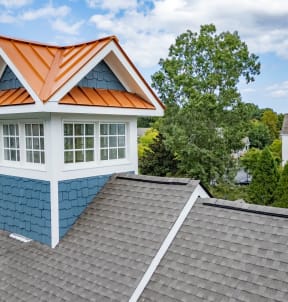 a dormer window on the roof of a house