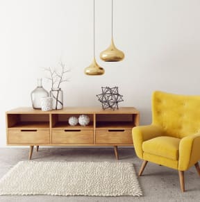 Yellow Chair in a Room at Hampton Apartments in Clearwater, FL 33759