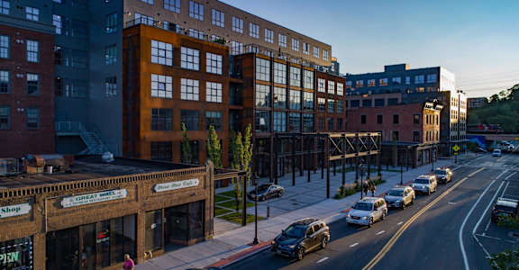 view of a city street with cars and buildings at Sono Central in Norwalk, CT, 06854