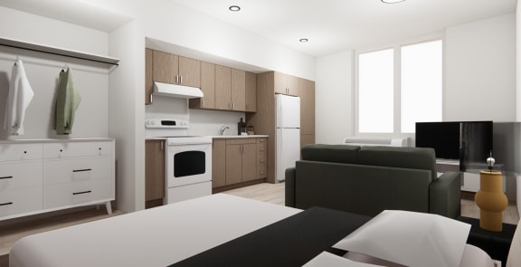Studio unit looking toward kitchen and windows.