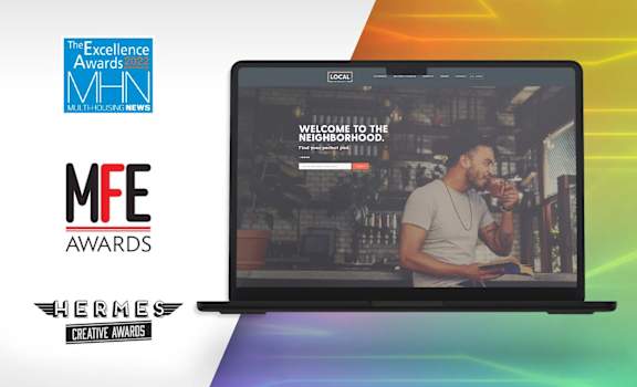 A laptop screen displays a welcome message to a neighborhood.