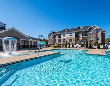 the swimming pool at the preserve at polo ridge apartments
