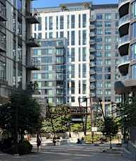 A modern building with a lot of windows and balconies.