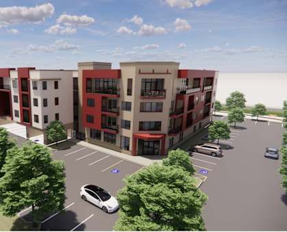 A rendering of a modern apartment complex with a parking lot in front. at Vintage at Lockwood Apartments, Oxnard 93036