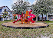Thumbnail 22 of 26 - Playground at Magnolia Village Apartments, Florida 32207