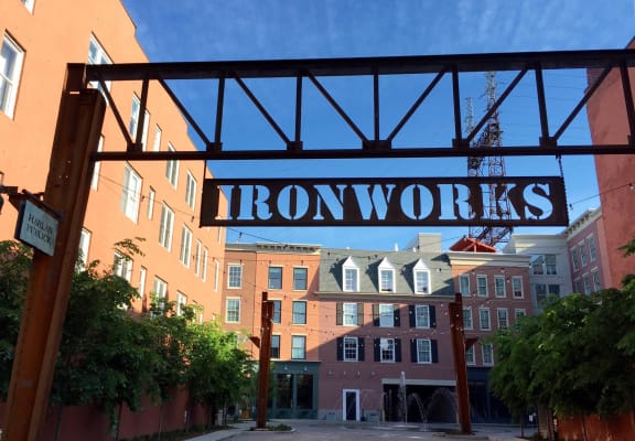 a sign that reads ironworks in front of a building  at Iron Works Sono, Norwalk, Connecticut