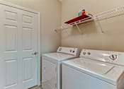 Thumbnail 10 of 26 - Laundry Room at Magnolia Village Apartments, Jacksonville