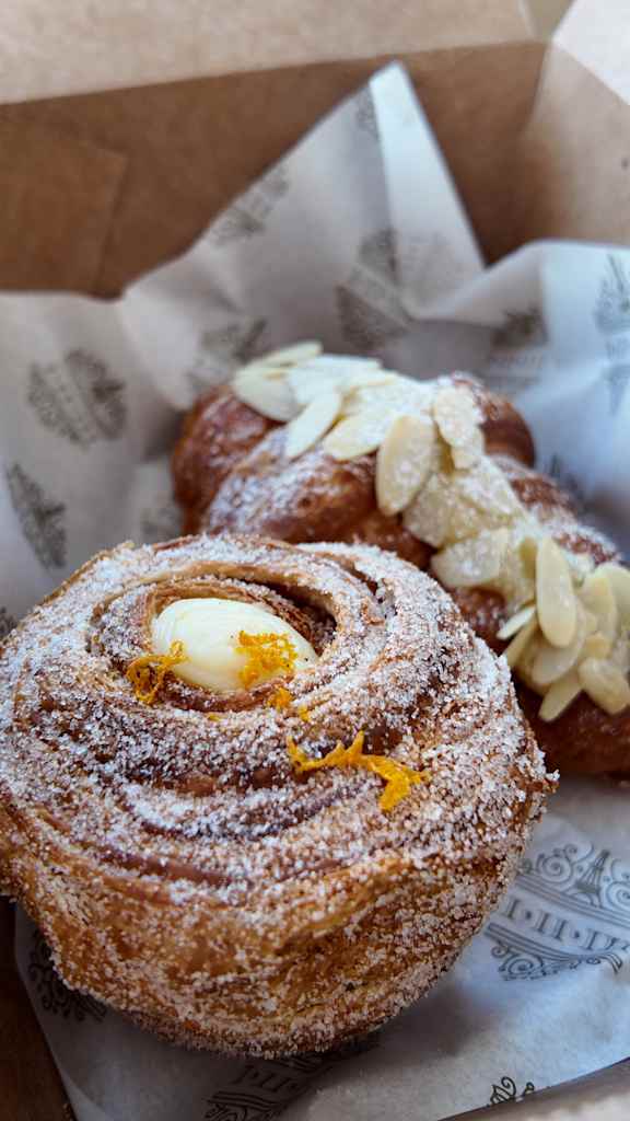 Pastry with a powdered sugar topping at Plaza at Pinnacle Hills, Arkansas, 72758