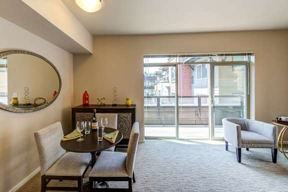 large room with floor to ceiling windows and a patio The Corydon, Seattle, WA, 98105