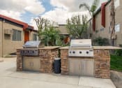 Thumbnail 31 of 41 - West Hills apartments bbq area
