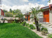 Thumbnail 20 of 41 - One-bedroom apartments in West Hills, CA - Topanga - Front Yard with Grass, Stairs, Palm Trees and Front Door.