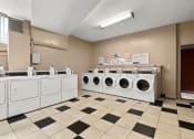 Thumbnail 35 of 41 - Apartments in West Hills CA - Laundry Facility Featuring Various Washer and Dryer