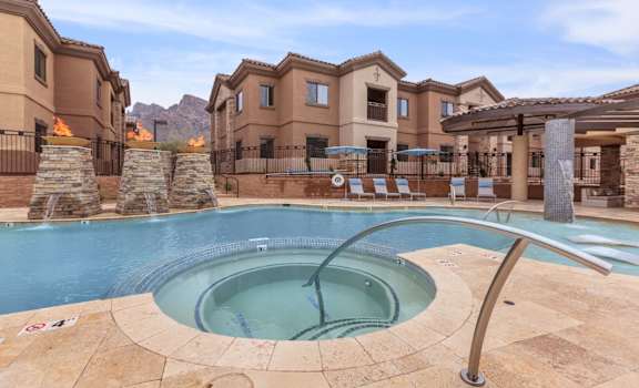 take a dip in the hot tub at villas at houston levee west apartments in at The Canyons at Linda Vista Trail, Oro Valley, AZ, 85704