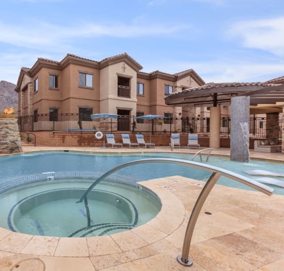 take a dip in the hot tub at villas at houston levee west apartments in