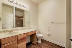 Modern bathroom at Legend of Lindale, featuring senior-friendly design and amenities