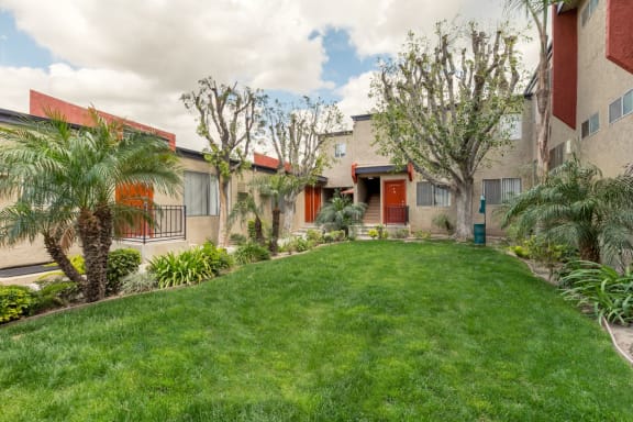 Apartments for Rent in West Hills CA - Topanga - Exterior of Apartment Buildings Lead to a Grassy Courtyard