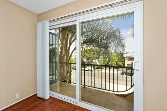 Mar Vista Apartments for Rent - Vista - Jones & Jones - Living Room With Sliding Glass Door Toward Patio